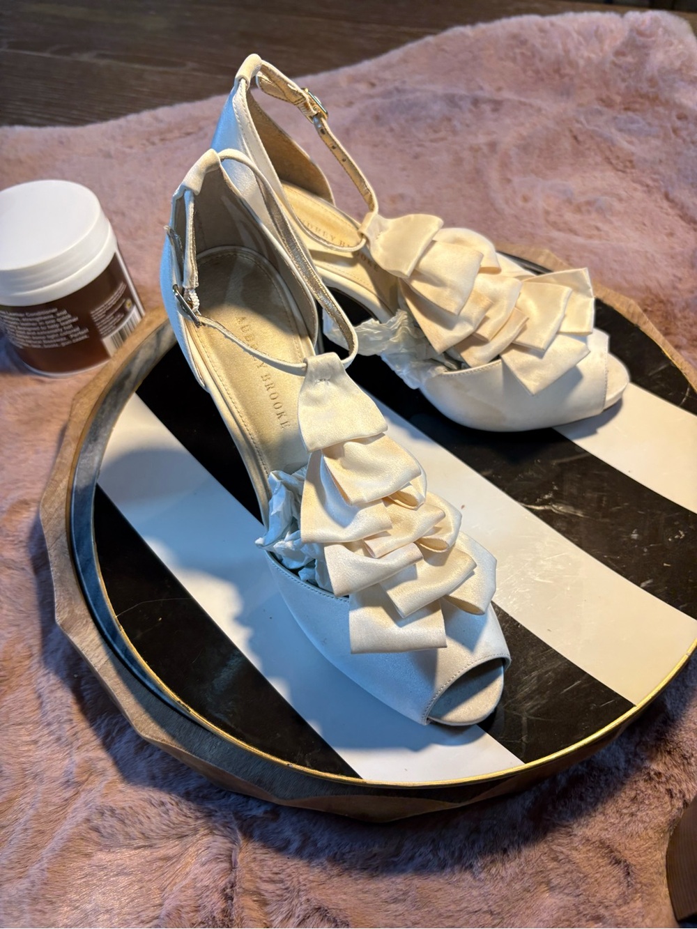 Audrey Brooke Estella Pump
With ruffles galore, this striking white pair of peep - Picture 8 of 8